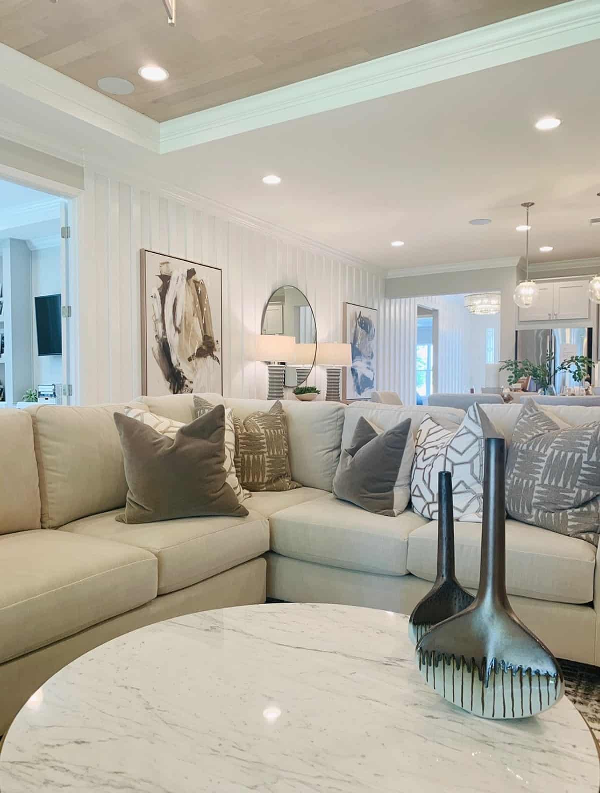 Neutrals with multiple textures using decor and wallpaper and marble table