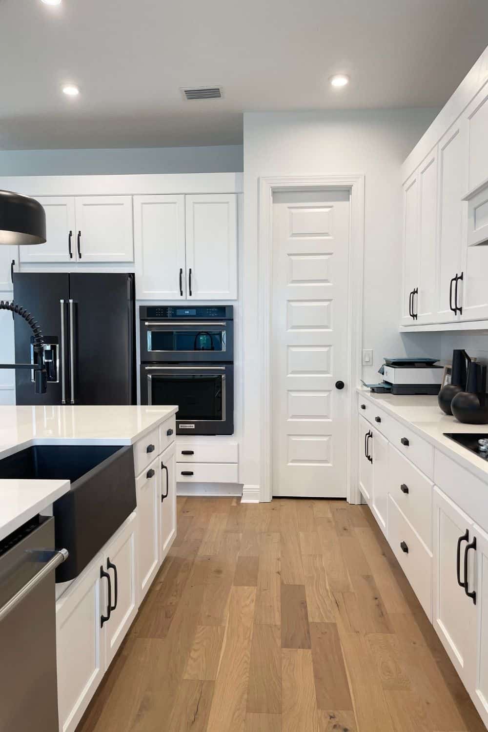 kitchen design white cabinets black appliances